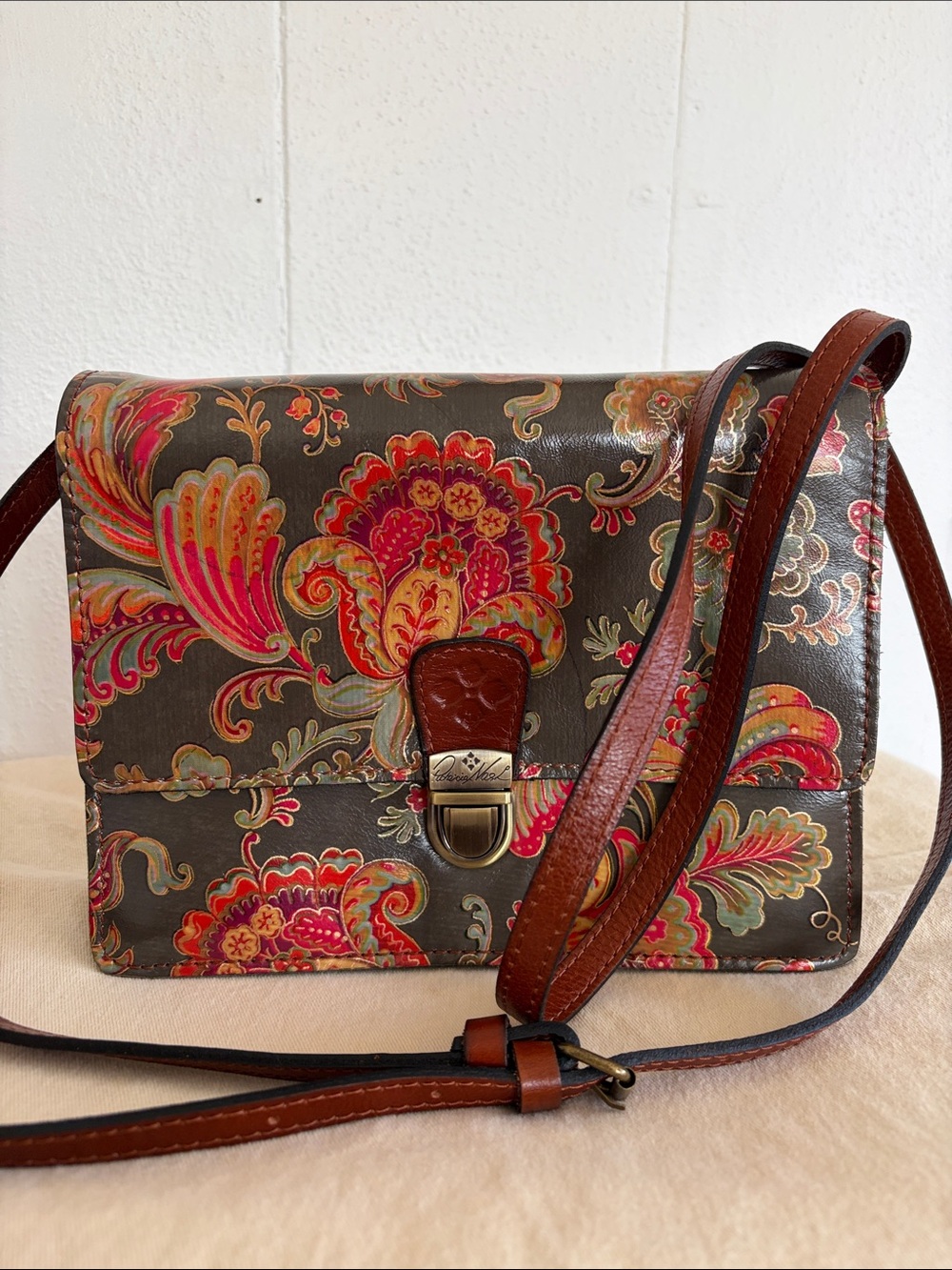 Patricia Nash Leather Crossbody Bag Green background w/Red & Blue Foral Print